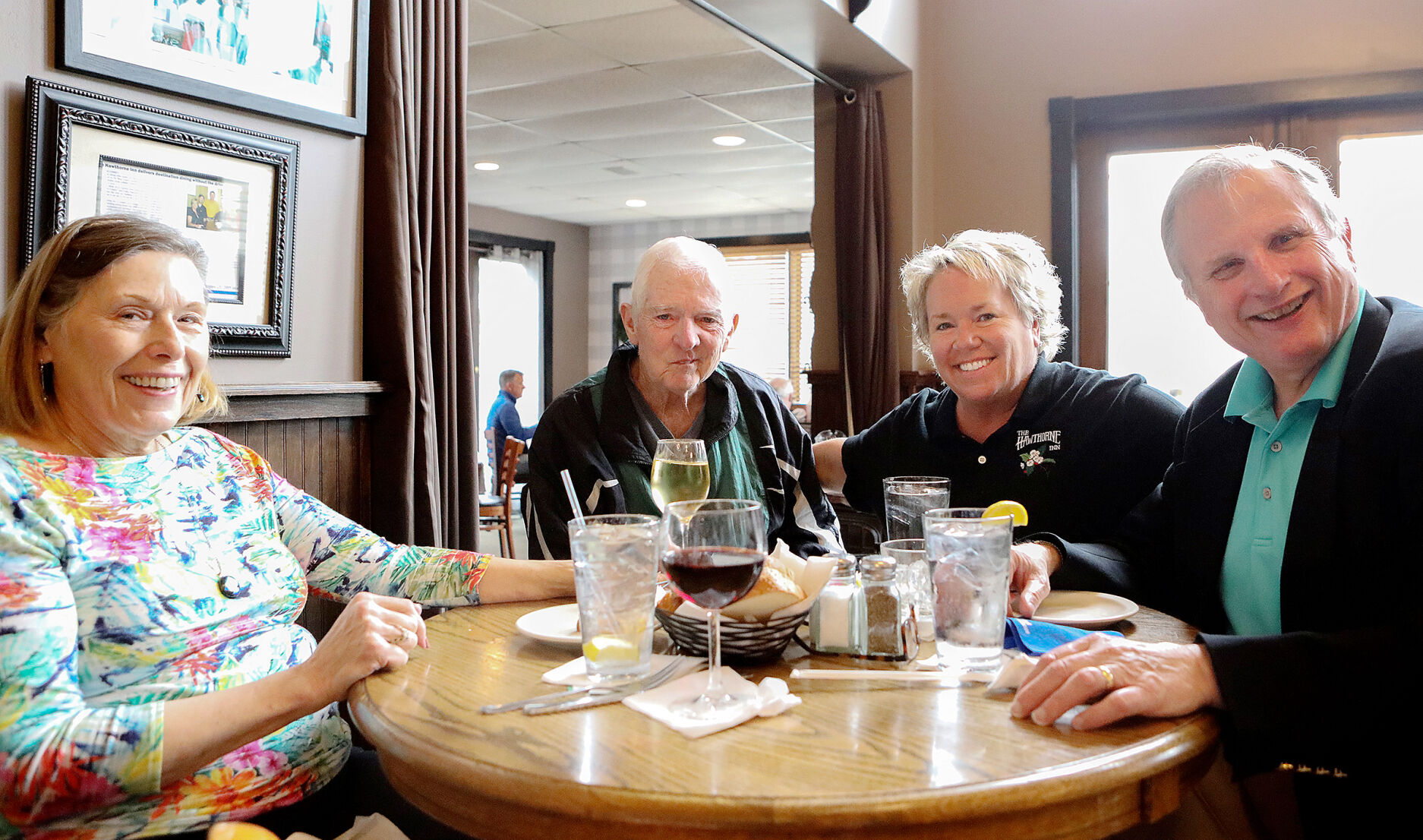 Jean and John Hauser and Bill Zastrow eat at The Hawthorne Inn
